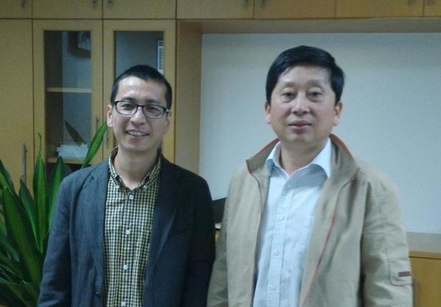 浙江省质量监督管理局党委书记杨烨先生与中国艺术家网韩英先生合影