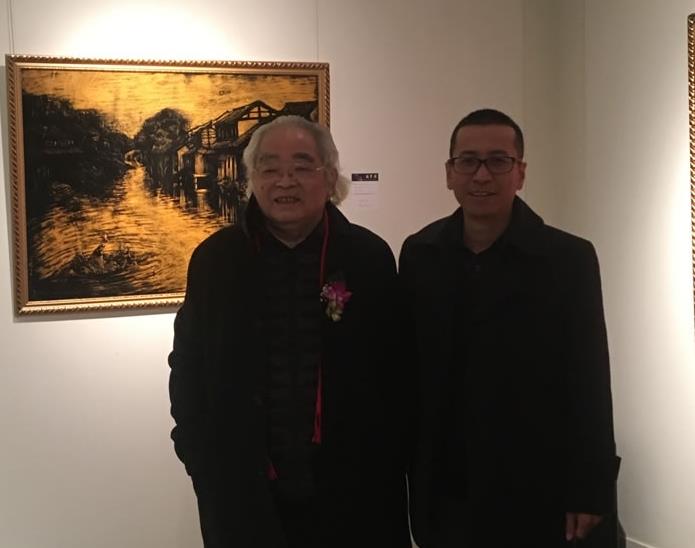 中国油画学会理事、国家一级美术师潘鸿海​与中国艺术家网韩英合影